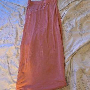 Long pink skirt.